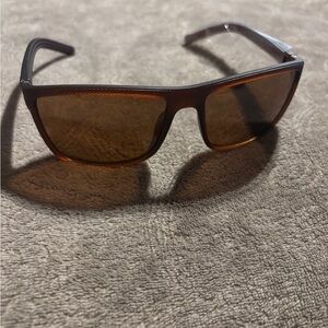 Paleshy Stylish Brown Sunglasses With a brown Tint . New with cover .